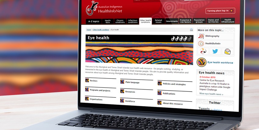 Eye health website displayed on laptop computer.
