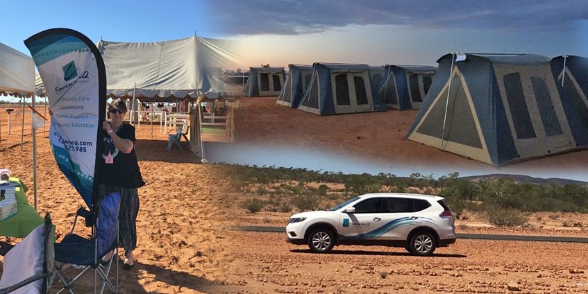 tents outback driving and woman with teardrop banner