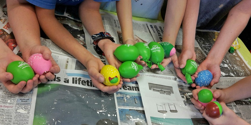 Kids showing home made balloon balls