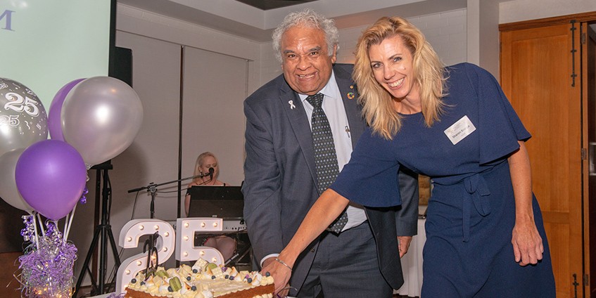 Keynote speaker, Professor Tom Calma, and sponsor HESTA’s Sharon Brugza, cut the cake to celebrate the National Rural Health Alliance’s 25th anniversary