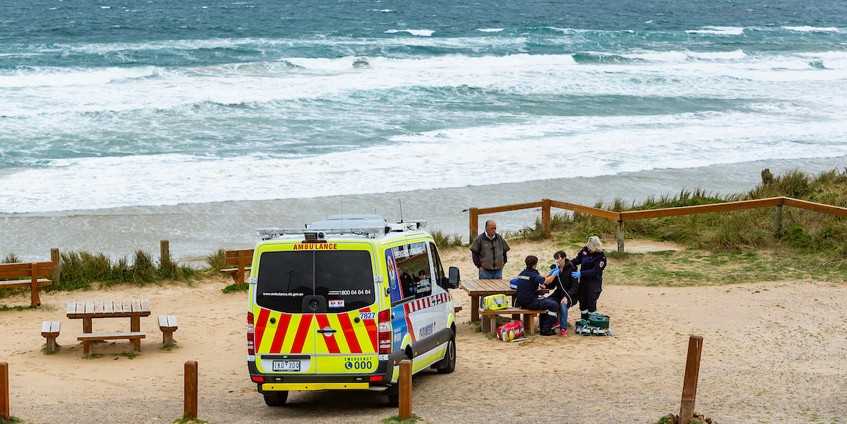 Paramedics at a coastal location