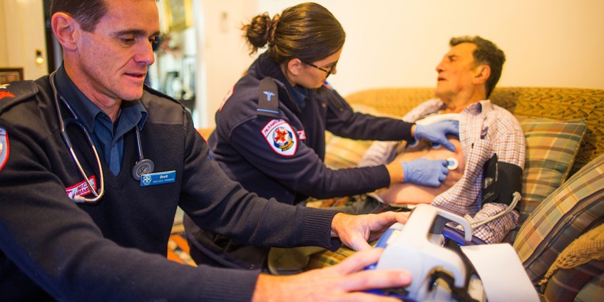 Paramedics with male patient
