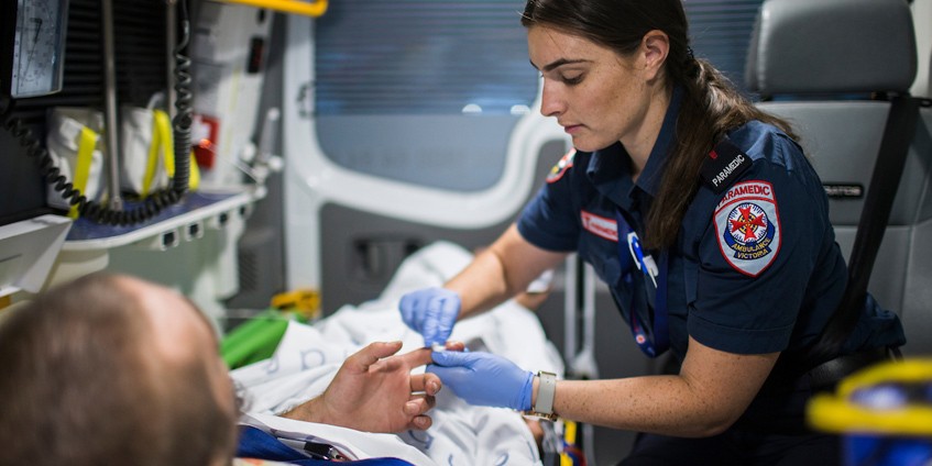 Paramedic with male patient