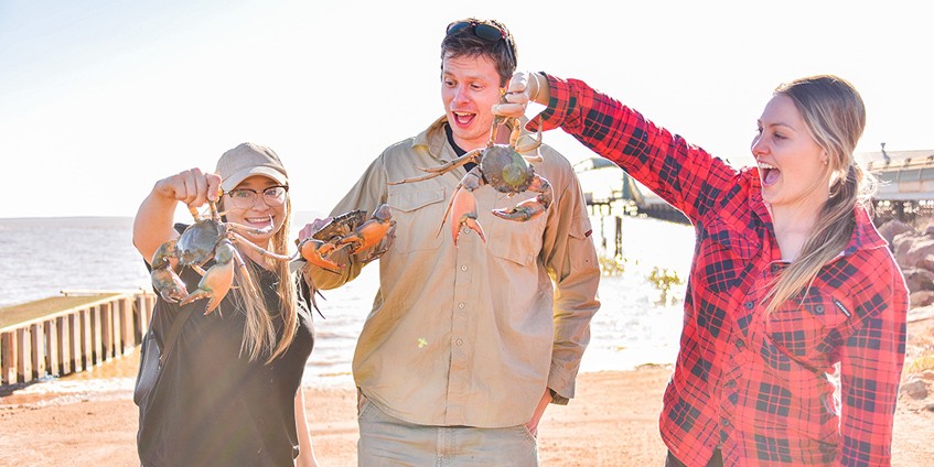 Jessica Watson, Tom Godfrey and Annabel Marshall mud crabbing in Derby