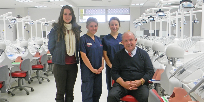 Scholarship recipients Amelia Judson (2013), Alayne White (2012) and Jessica Powell (2011) with Senator John Williams when he visited Charles Sturt University, Orange, in 2013