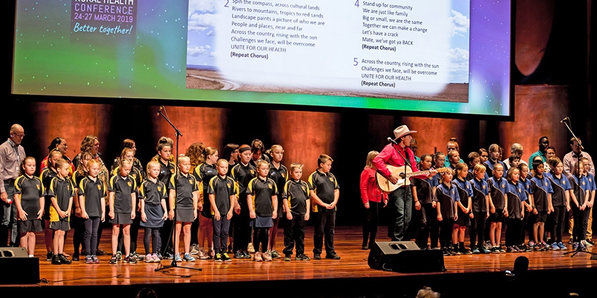 Josh Arnold and choir