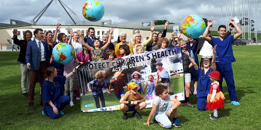 group of people on parliament house lawns