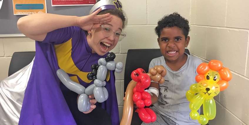 Starlight and young boy with balloons