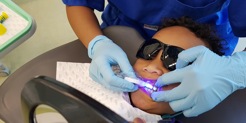 Boy getting his teetch checked