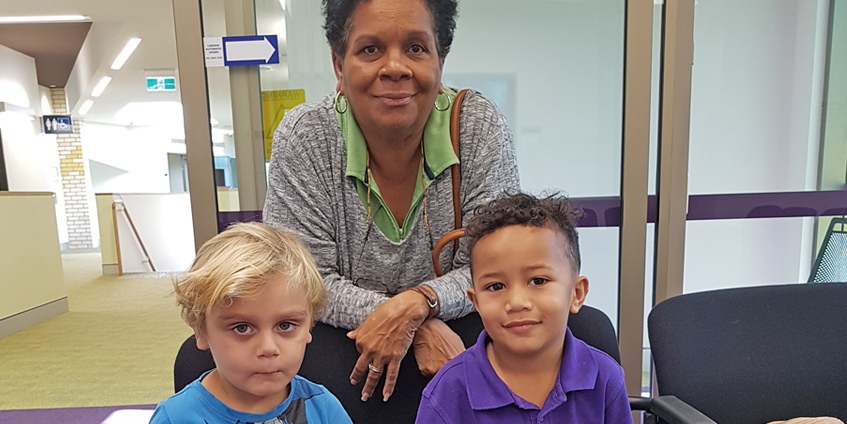 Nancy Hegarty with children at the clinic
