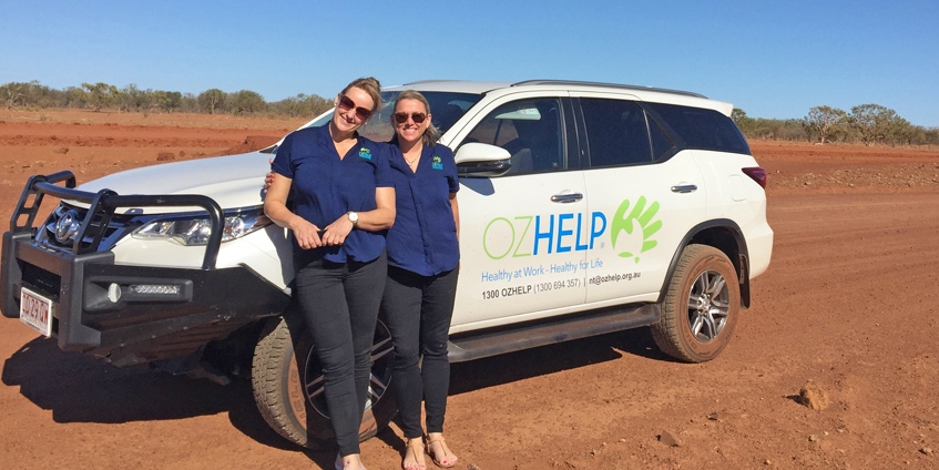 Two members of the OzHelp team in rural Australia. Photo: OzHelp