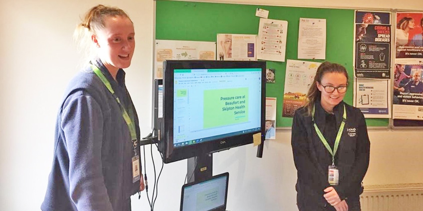 Students Erin Fahey (left) and Madeline Nixon (right) putting on an education session for nursing staff. Photo: Charmaine Swanson