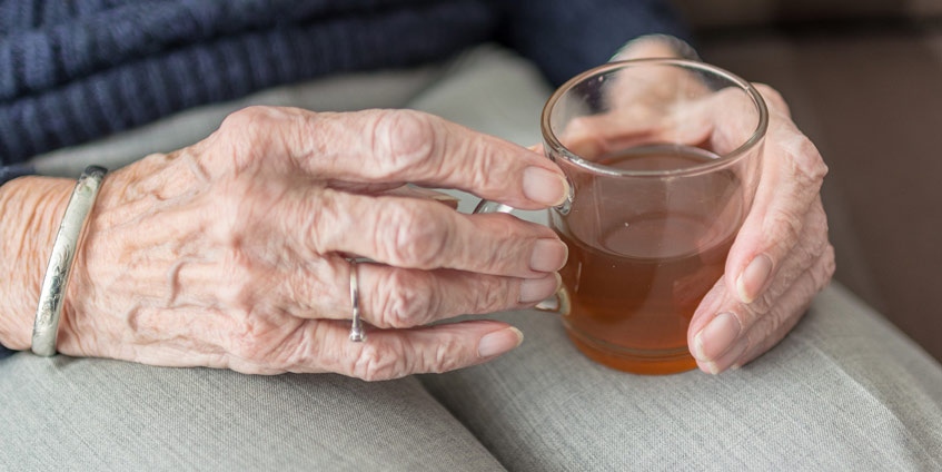 Older woman with drink