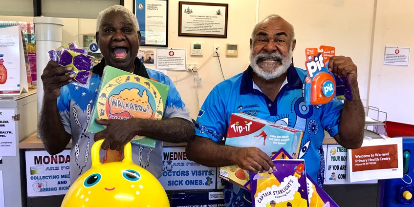 Douglas and Eda at the Warruwi Clinic, NT, receiving their Starlight goodies pack