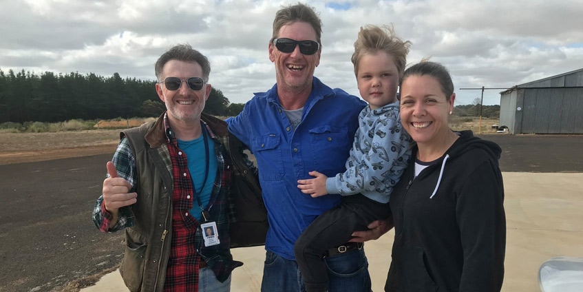 Left to right: Angel Flight volunteer pilot Selwyn Favish, Timothy, Max and Braide (Henty locals)