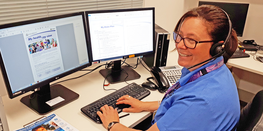 A chronic conditions coordinator carrying out a phone follow up.