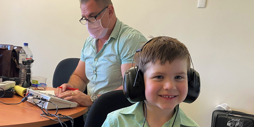 Five-year-old AJ from the Parkes Shire having just had his hearing tested.