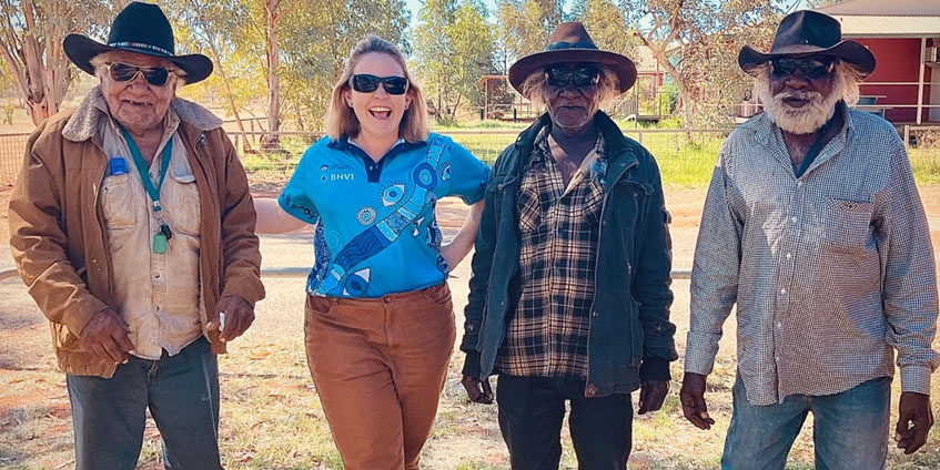 Optometrist Sarah with Ronnie, Peter and Johnny in Laramba community after COVID-19 vaccinations and eye tests.