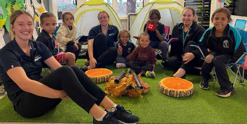 Occupational therapy student Keely Fitzpatrick and speech pathology students Hannah Simons and Georgi Leahy, with Yalgoo Primary School students Trezelle Page, Kaliyah Greham, Ava Simpson, Josh Callow, Angelica Simms and Zackeisha Taylor.