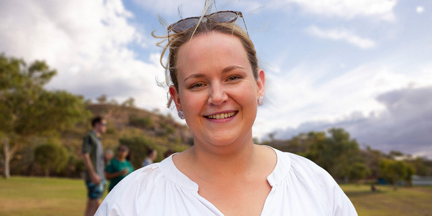 Dr Sally Magoffin enjoying the sunset at Lake Moondarra, Mount Isa. [Image: James Cook University]