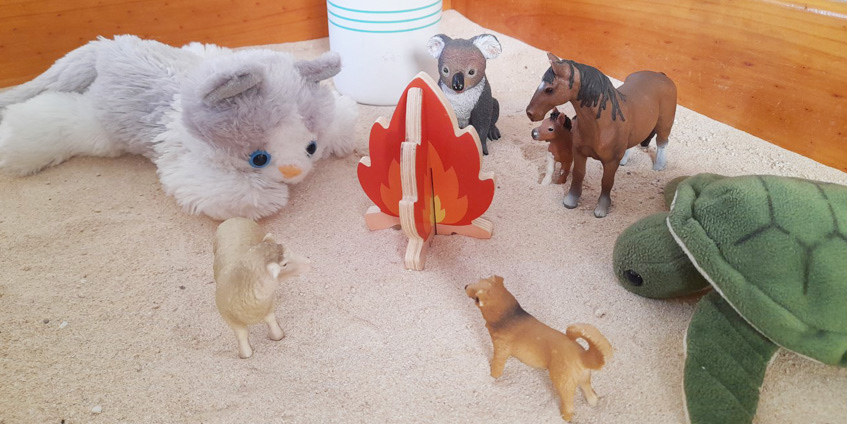 A play therapy scene of a fire, created with toys from the playroom. [Image: Nicky Nilsson]