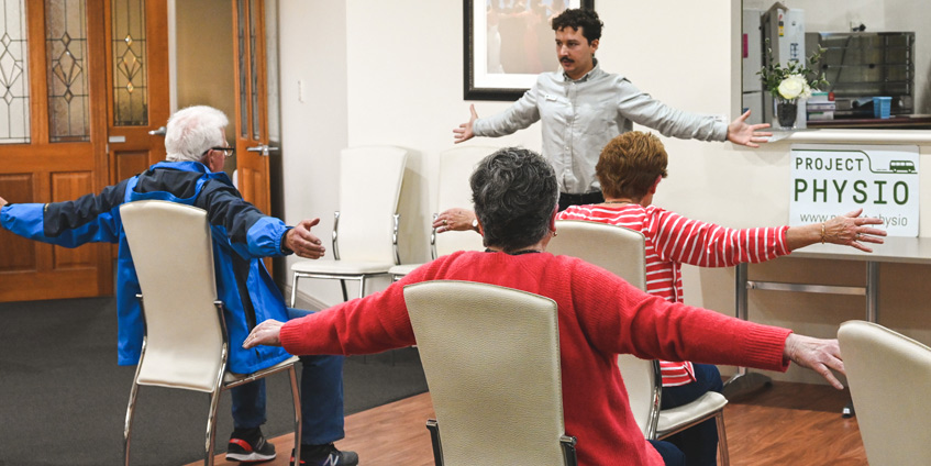 David conducting a class with elderly patients