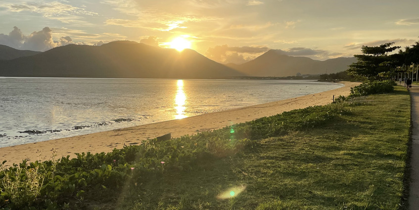Queensland sunset over a grassy beach