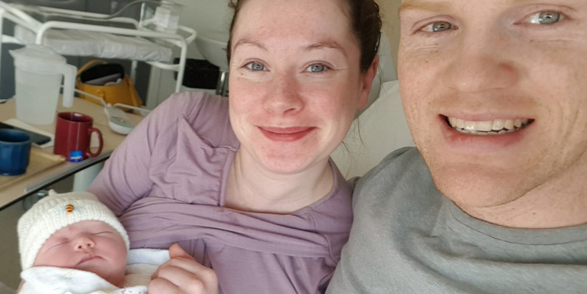 Adelaide and her partner with baby shortly after giving birth.