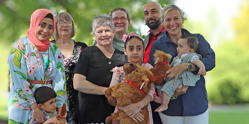 Glen Innes committee with new doctor and family.