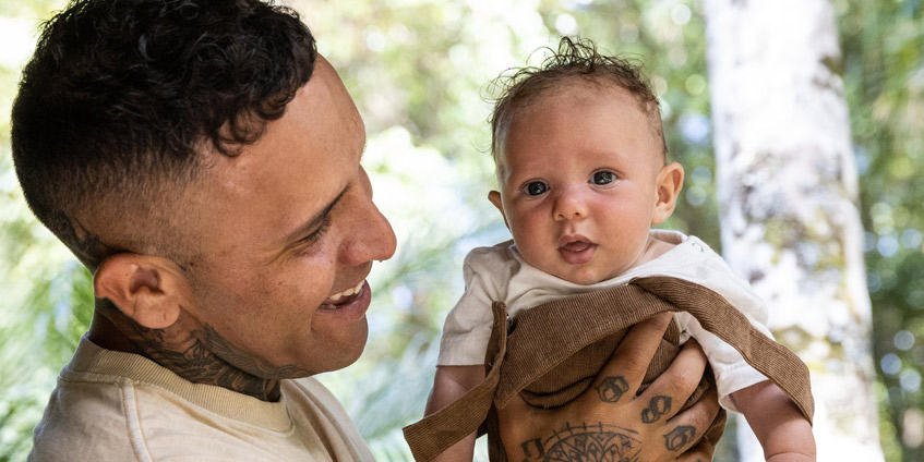 Man holding baby