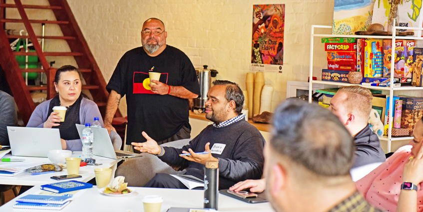 First Nations Philanthropic Funders Working Group - People seated at table discussing