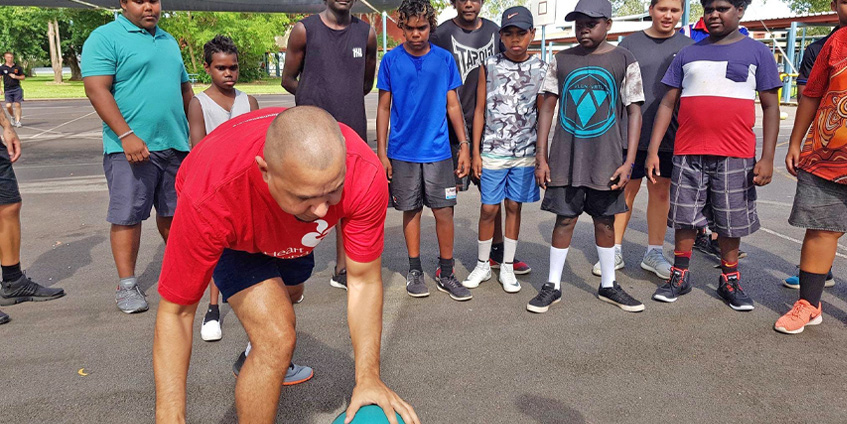 Timmy Duggan with Hoops 4 Health participants