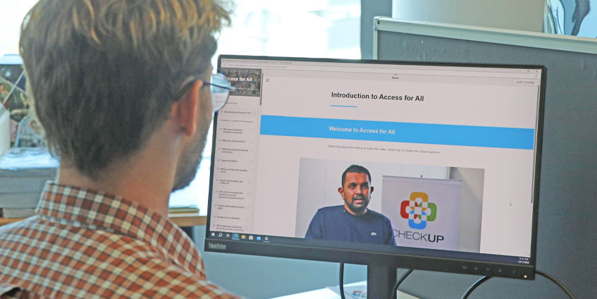 Man using computer to use Access for All