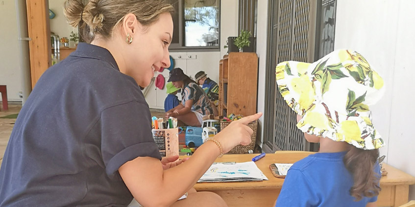 Female team member with young kindergarten child