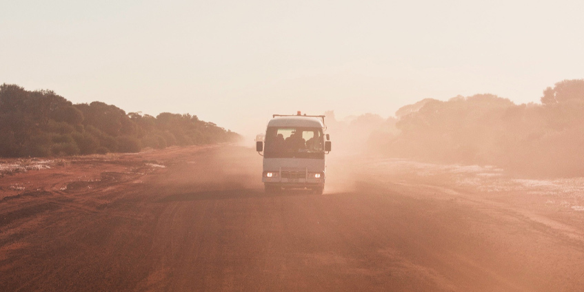 Bus travelling on a desert road