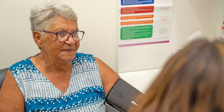 A one-on-one blood pressure check consultation