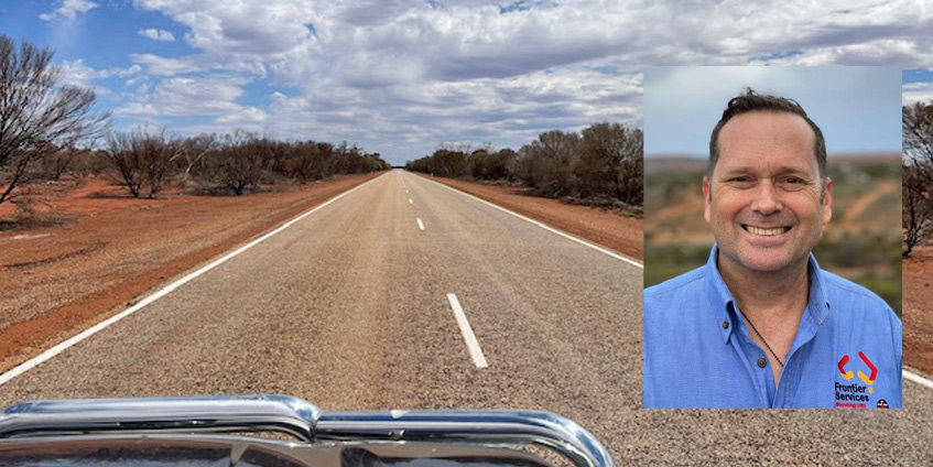 Long rural road taken from inside 4wd with image of Lindsay Ginn