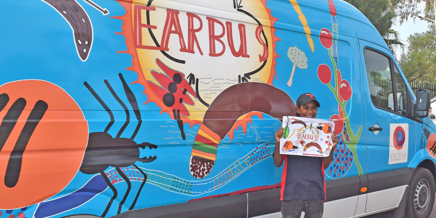 Artist Fabian with original Goldfields bus art