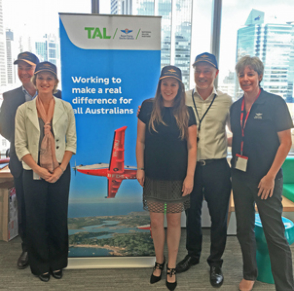RFDS staff in front of TAL banner