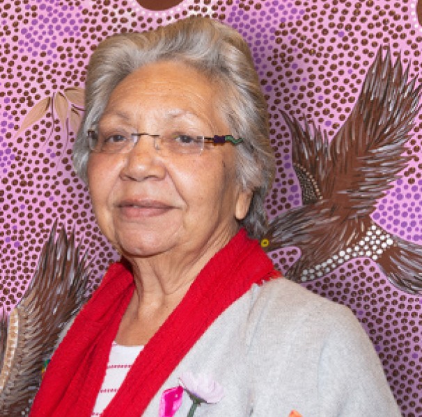 Matilda House presents her Reconciliation Action Plan artwork to Chair of the Alliance RAP Working Group, Geri Malone