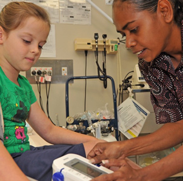 Practice nurse with young patient