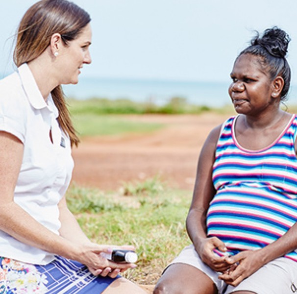 Rural Phramacist with customer