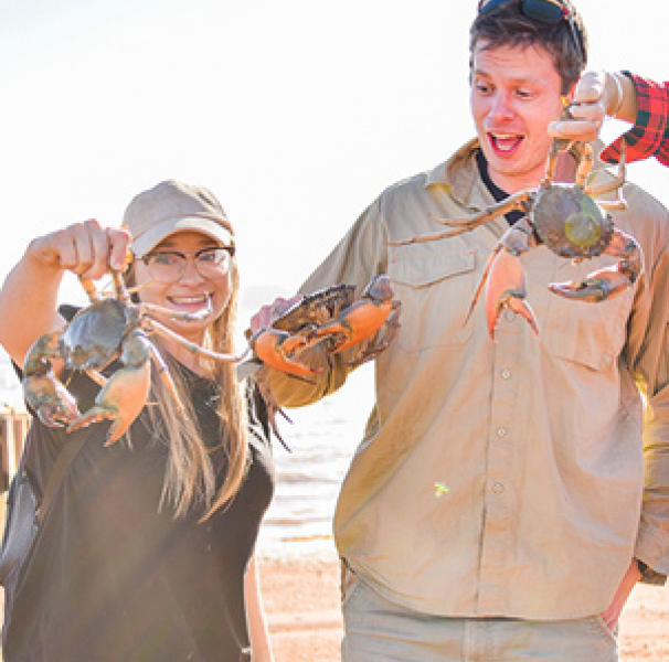 Jessica Watson, Tom Godfrey and Annabel Marshall mud crabbing in Derby