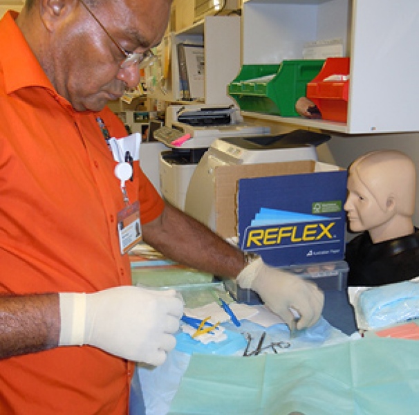 Man practicing sutures