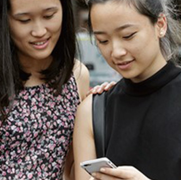 Yound women using a mobile phone