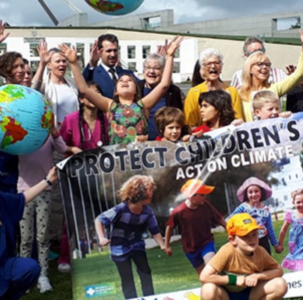 group of people on parliament house lawns