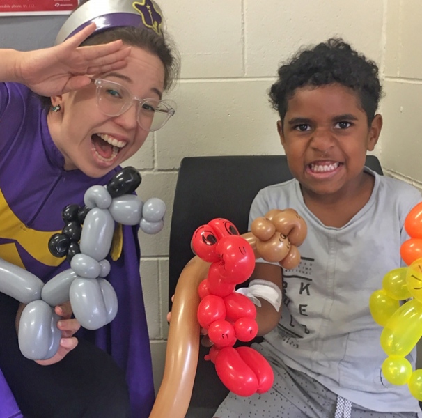 Starlight and young boy with balloons
