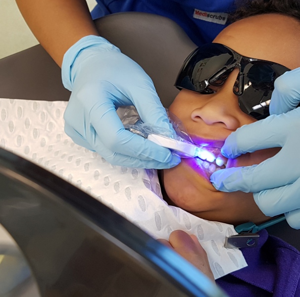 Boy getting his teetch checked