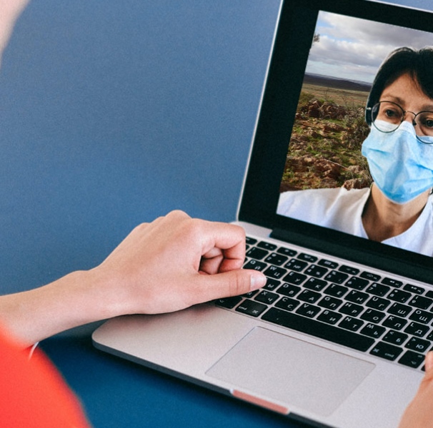 woman using laptop for remote conversation