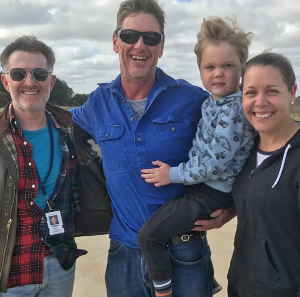 Left to right: Angel Flight volunteer pilot Selwyn Favish, Timothy, Max and Braide (Henty locals)